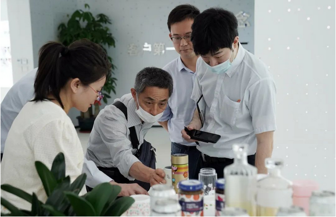 爱普生代表团莅临狗万官网总部参观交流